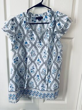 2 sets of woman’s dress tops size L
